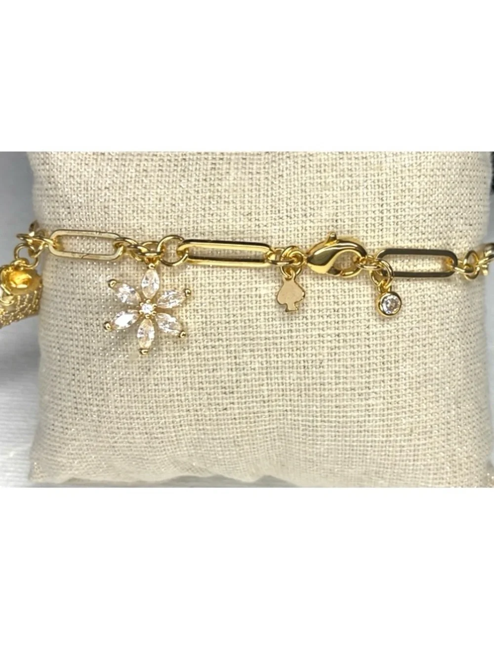 kate spade Gold-Tone Ice Skate & Snowflake Charm Bracelet with Pink Accents - Picture 4 of 9